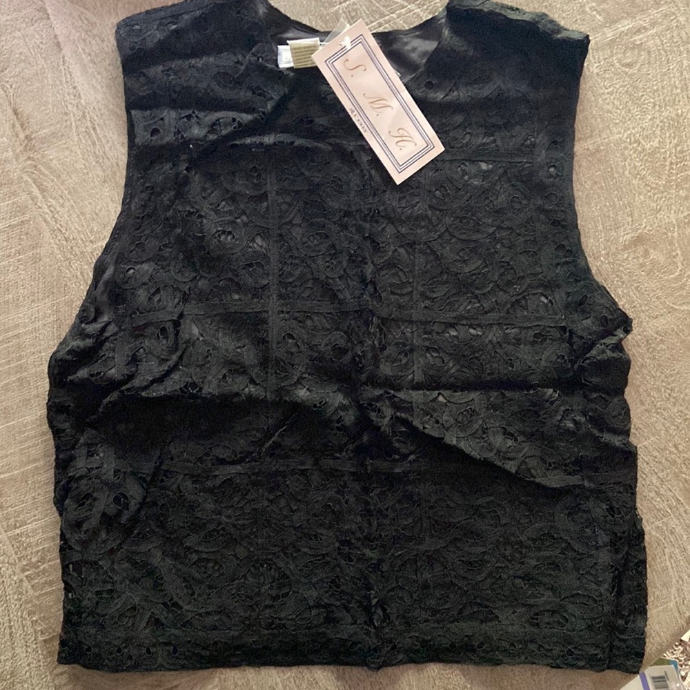 Brand new with tanks beautiful lace tank top with lining. Size Large